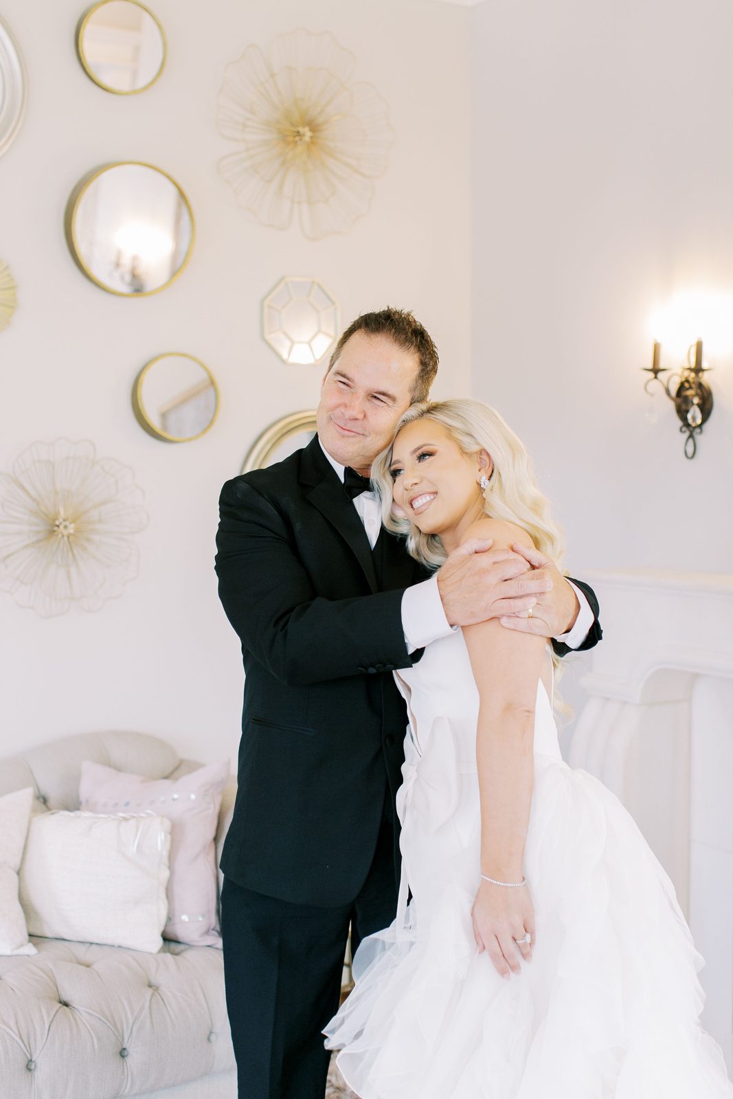 Alexa embracing her father before the ceremony
