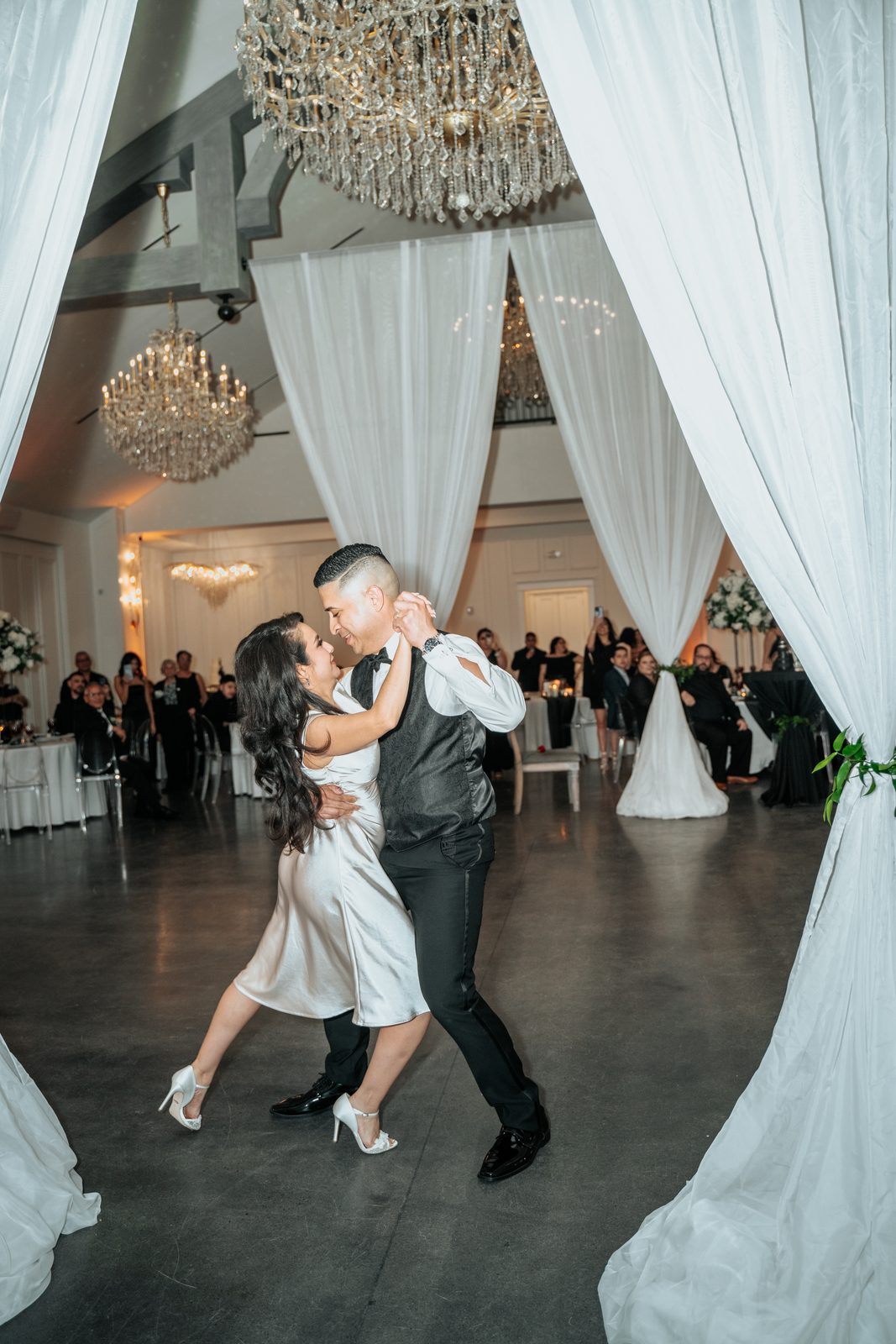 Amber and Walter's first dance under the chandeliers