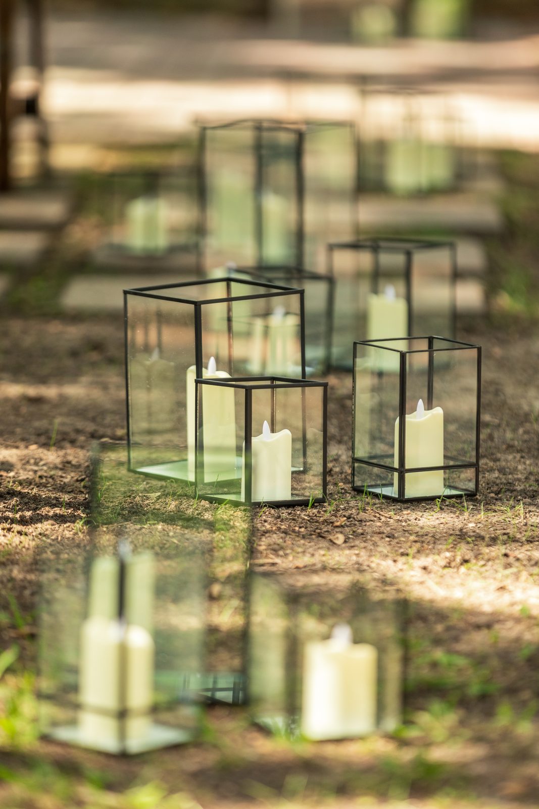 Lantern candles lining the ceremony aisle