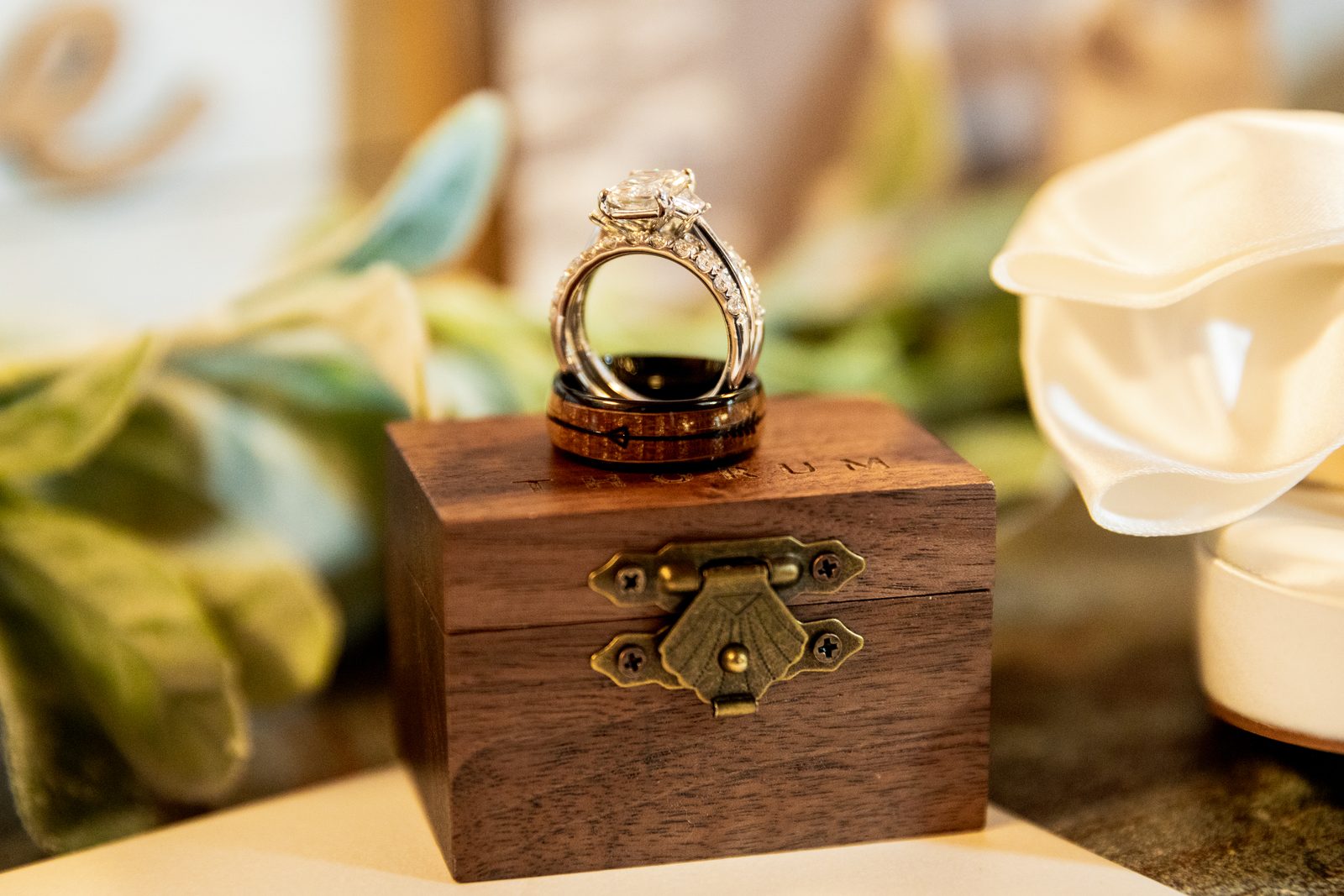 Wedding rings detail on a wooden box