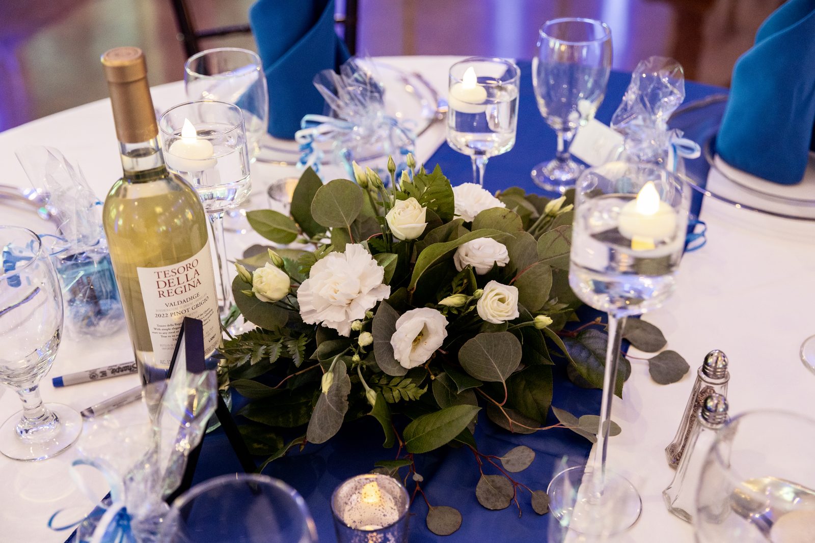 Reception table centerpiece with white florals