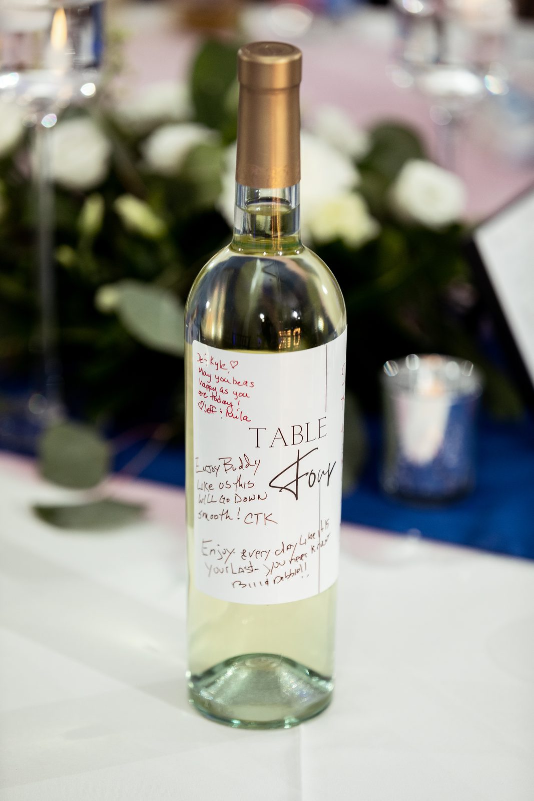 Wine bottle signed by guests with well wishes