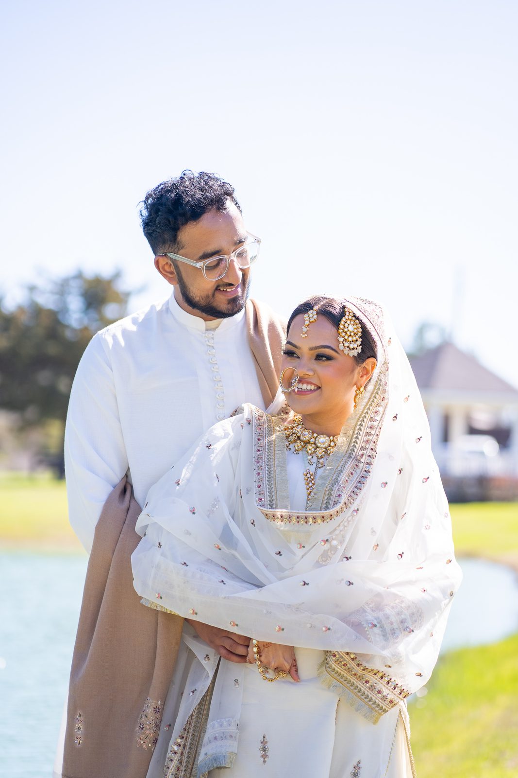Maria and Mehrose portrait outdoors by the pond