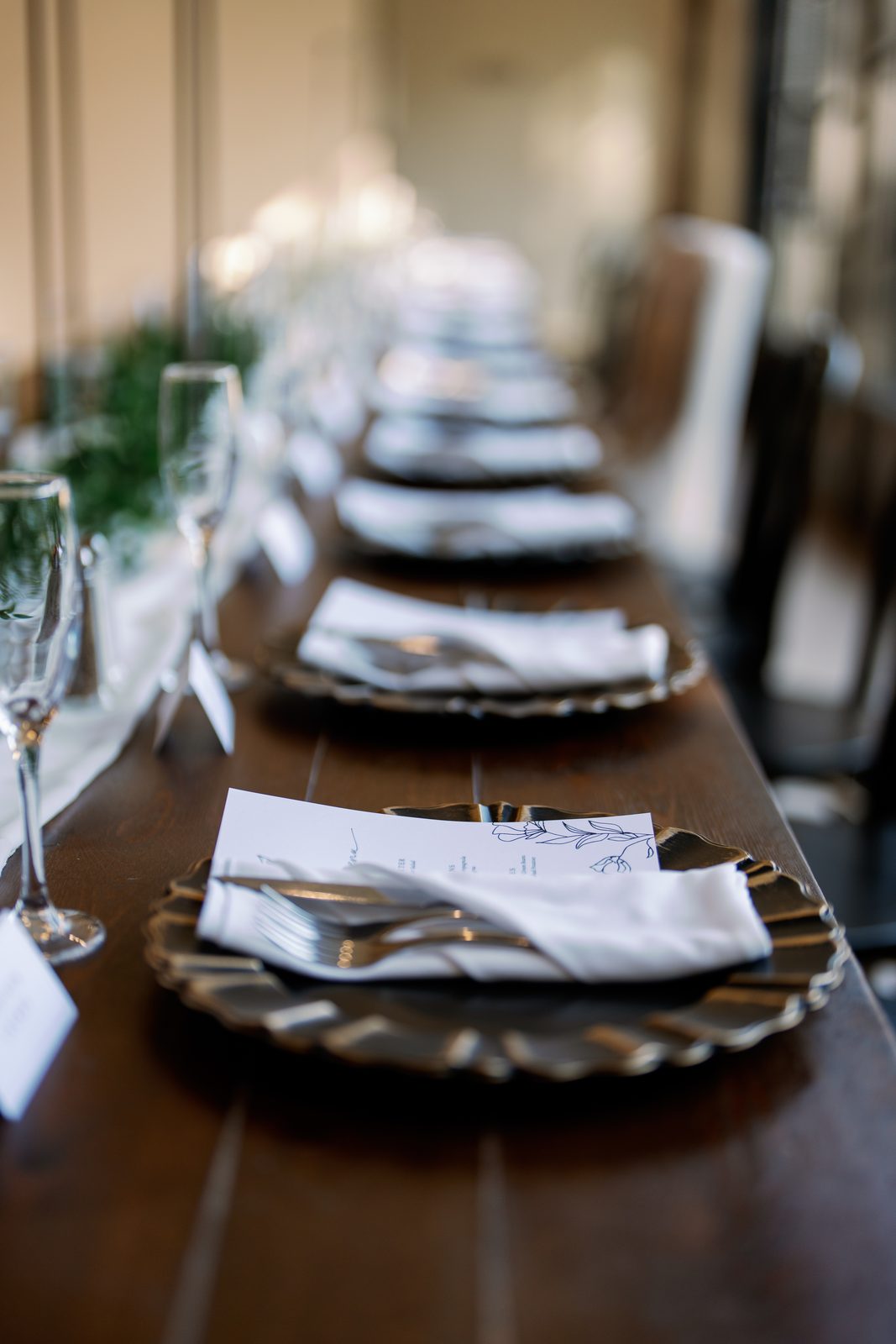 Reception table setting with a hand-illustrated menu card