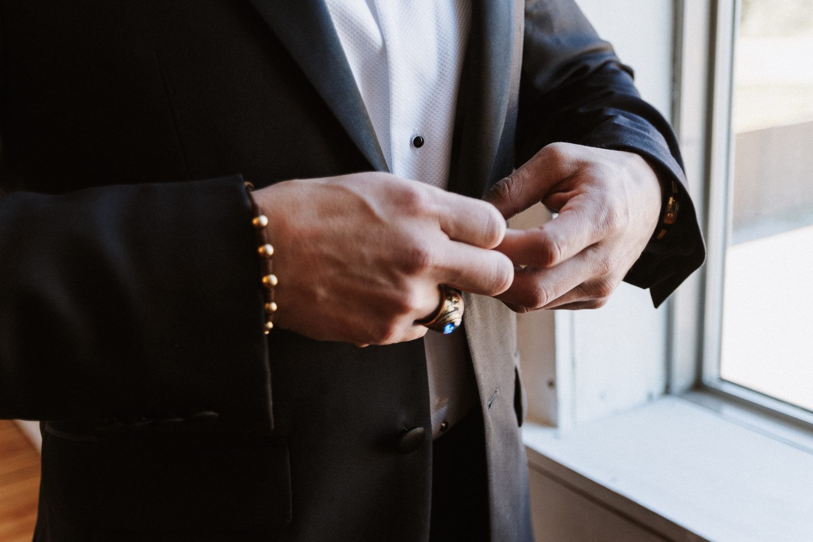 Detail of Steven's cufflink and ring