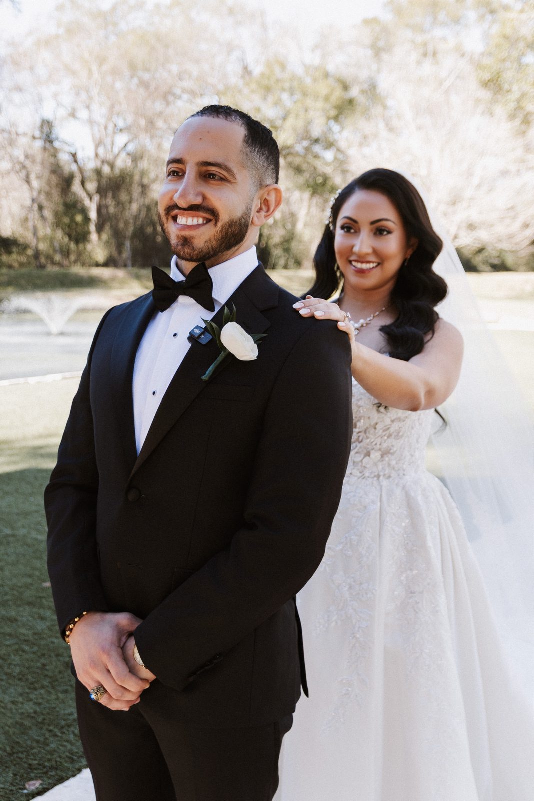 Perla with her hand on Steven's shoulder outdoors