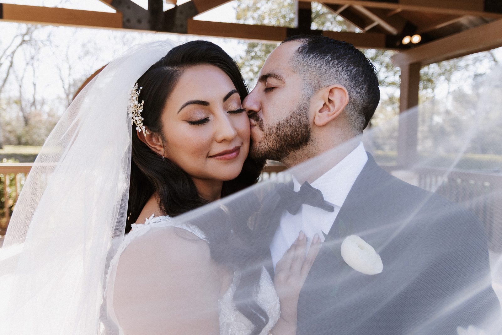 Steven kissing Perla's cheek under her veil