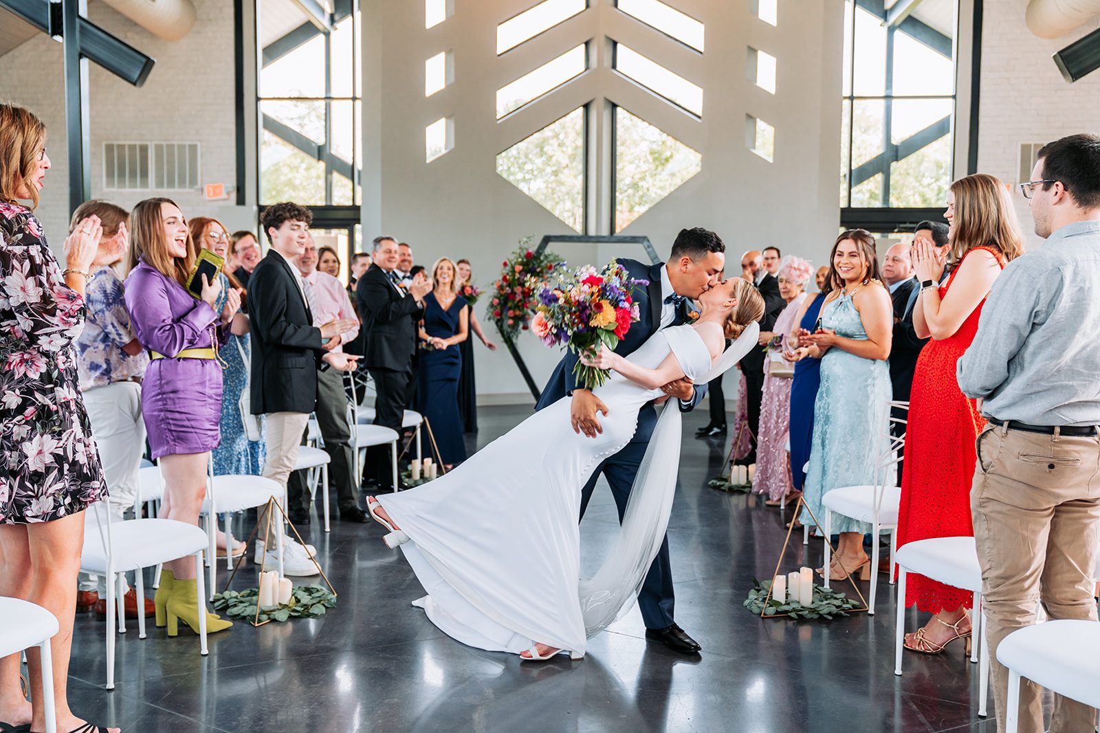 Sara and Gus's recessional dip kiss