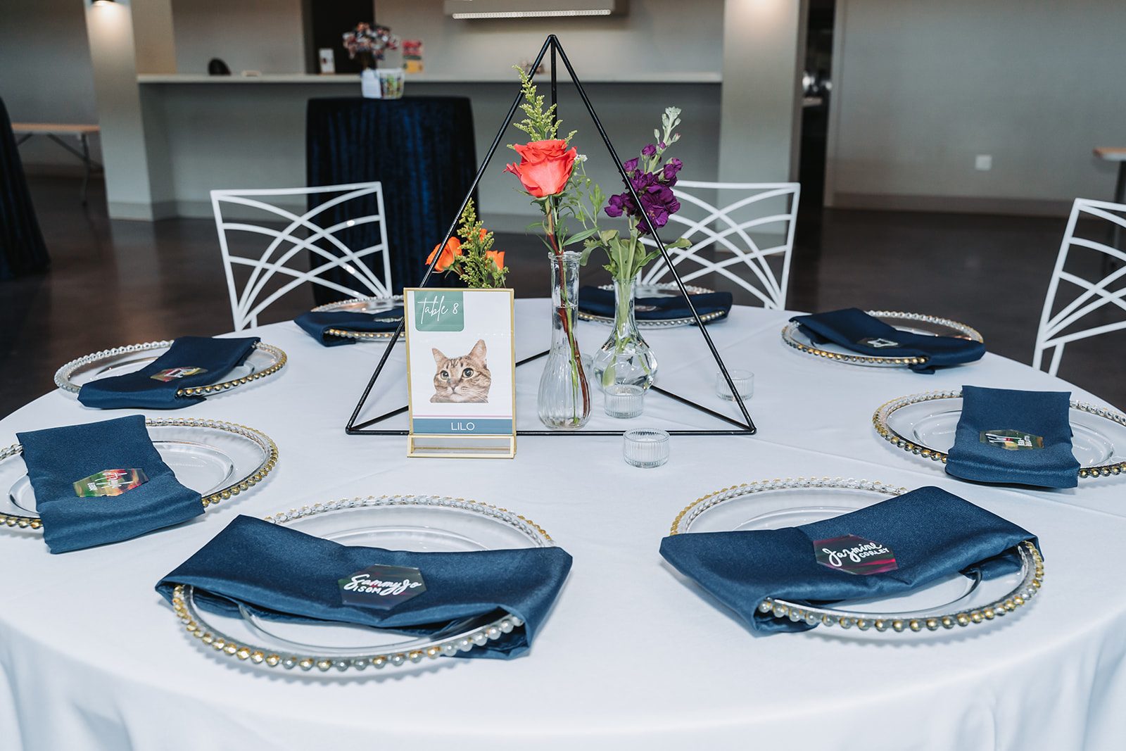 Reception table setting with pet-themed table names